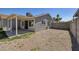 Backyard view with covered patio and fencing at 5535 Oxbow St, Las Vegas, NV 89119