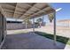 Covered patio and spacious backyard with block fencing at 5535 Oxbow St, Las Vegas, NV 89119