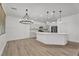 Bright kitchen with ample counter space, stainless steel appliances, and modern lighting at 576 Foster Springs Rd, Las Vegas, NV 89148