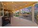 Spacious covered patio with string lights, offering a relaxing outdoor living area at 5823 Falling Stream Ave, Las Vegas, NV 89131