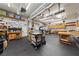 This large garage has storage cabinets, workbenches, and ample lighting at 5823 Falling Stream Ave, Las Vegas, NV 89131