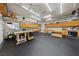 This large garage has storage cabinets, workbenches, and ample lighting at 5823 Falling Stream Ave, Las Vegas, NV 89131