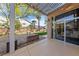 Relax on the patio with a fire pit and lush landscaping, and easy access to indoors at 5823 Falling Stream Ave, Las Vegas, NV 89131