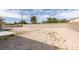 Picture of a spacious dirt backyard with a concrete patio, awaiting personalization at 6131 Rio Vista St, Las Vegas, NV 89130
