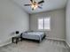 Bedroom featuring a ceiling fan, window with shutters, and a bed with a dark frame at 6131 Rio Vista St, Las Vegas, NV 89130