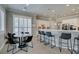 Breakfast nook opens to updated kitchen with bar seating and views to living areas at 6131 Rio Vista St, Las Vegas, NV 89130