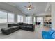 Open concept living room, dining room, and kitchen with modern finishes and an abundance of light at 6131 Rio Vista St, Las Vegas, NV 89130