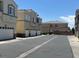 Exterior street view of multiple units with garages at 6170 E Sahara Ave # 1012, Las Vegas, NV 89142