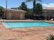 Exterior community pool and pool house at 6170 E Sahara Ave # 1012, Las Vegas, NV 89142