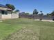 Spacious backyard with artificial turf and a concrete perimeter block wall, providing privacy at 6231 Santa Maria Ave, Las Vegas, NV 89108