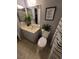 Standard bathroom featuring a toilet, sink with vanity, and a shower/tub combo with a striped curtain at 6231 Santa Maria Ave, Las Vegas, NV 89108