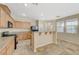Spacious kitchen area with granite countertops, breakfast bar, and plentiful cabinet space at 6255 W Arby Ave # 258, Las Vegas, NV 89118