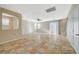Spacious living area enhanced by tiled floors, and a sliding glass door for natural light at 6255 W Arby Ave # 258, Las Vegas, NV 89118