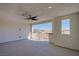 The covered balcony provides lots of sunlight and overlooks the cityscape in the distance at 6288 Dolosonte St, Las Vegas, NV 89113