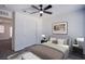 Bedroom with ceiling fan and modern decor at 6288 Dolosonte St, Las Vegas, NV 89113