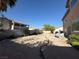 Wide open backyard with gravel landscaping and potential for custom design at 6351 Davidson Ct, Las Vegas, NV 89110