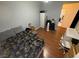 Comfortable bedroom features dark wood floors and grey walls at 6351 Davidson Ct, Las Vegas, NV 89110