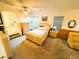 Well-lit bedroom with neutral tones and natural light through window at 6351 Davidson Ct, Las Vegas, NV 89110