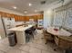 Bright kitchen features an island with seating, double ovens, and ample counter space for cooking at 6351 Davidson Ct, Las Vegas, NV 89110