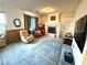 Comfortable living room with fireplace and cozy seating area at 6351 Davidson Ct, Las Vegas, NV 89110
