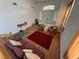 Bright living room features vaulted ceilings, hardwood floors, and abundant natural light at 6351 Davidson Ct, Las Vegas, NV 89110
