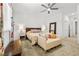 Cozy main bedroom features a decorative headboard and comfortable seating at 6425 Classic Ridge St, North Las Vegas, NV 89086