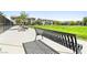 Neighborhood park featuring a large grassy lawn, shady trees, and inviting benches for residents at 6425 Classic Ridge St, North Las Vegas, NV 89086