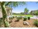 Landscaped community park boasts lush greenery, mature trees, and a walking path for residents at 6425 Classic Ridge St, North Las Vegas, NV 89086