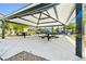Covered picnic area features multiple tables and seating, perfect for outdoor gatherings and community events at 6425 Classic Ridge St, North Las Vegas, NV 89086
