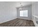 Dining room featuring hardwood floors, neutral wall colors, and bright lighting at 6540 W Cougar Ave, Las Vegas, NV 89139