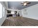 Spacious kitchen with dark cabinets, an island and stainless steel appliances at 6540 W Cougar Ave, Las Vegas, NV 89139