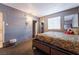 Bedroom with mirrored closet doors and neutral decor showcasing comfortable living at 6608 Burgundy Way, Las Vegas, NV 89107