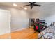 Bedroom with modern gamer chair and second door at 6608 Burgundy Way, Las Vegas, NV 89107