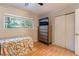 Bedroom featuring a chest of drawers, window, ceiling fan, and closet at 6608 Burgundy Way, Las Vegas, NV 89107