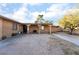 Cozy home featuring an inviting covered porch, gravel landscaping, and a welcoming entrance at 6608 Burgundy Way, Las Vegas, NV 89107