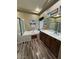 A spacious bathroom with a soaking tub, double vanity, and modern fixtures at 7524 Midnight Rambler St, Las Vegas, NV 89149