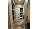 Hallway view with hallway closet and view to the bathroom at 7524 Midnight Rambler St, Las Vegas, NV 89149
