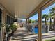 Extended covered patio with ceiling and view of the pool at 7524 Midnight Rambler St, Las Vegas, NV 89149