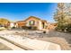 Charming single-story home with a two-car garage and low-maintenance landscaping at 766 Topocoba St, Las Vegas, NV 89178