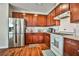 Well-equipped kitchen with stainless steel appliances, white subway tile backsplash, and ample counter space at 766 Topocoba St, Las Vegas, NV 89178