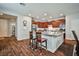 Kitchen featuring granite countertops, stainless steel appliances, and breakfast bar at 766 Topocoba St, Las Vegas, NV 89178