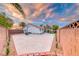 Large backyard featuring an expansive paved area with room for various activities and amenities at 7670 Descanso Ln, Las Vegas, NV 89123