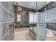 Spa-like main bathroom featuring a soaking tub, glass shower, and modern fixtures at 7670 Descanso Ln, Las Vegas, NV 89123