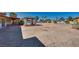 Spacious backyard with a gazebo, palm trees, and potential for landscaping at 7950 Red Barn Dr, Las Vegas, NV 89123