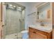 Bathroom with glass shower door, modern sink and fixtures at 7950 Red Barn Dr, Las Vegas, NV 89123