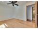 Bedroom with ceiling fan and ensuite bathroom entrance at 7950 Red Barn Dr, Las Vegas, NV 89123