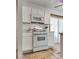 Modern kitchen featuring white cabinets, stainless steel appliances, and ample counter space at 7950 Red Barn Dr, Las Vegas, NV 89123