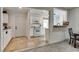 Bright kitchen with white cabinets, marble countertops, and stainless steel appliances at 7950 Red Barn Dr, Las Vegas, NV 89123