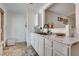 Kitchen sink and countertop area featuring marble countertops and stainless steel faucet at 7950 Red Barn Dr, Las Vegas, NV 89123