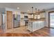 Spacious kitchen with stainless steel appliances and adjacent dining area at 7950 Red Barn Dr, Las Vegas, NV 89123
